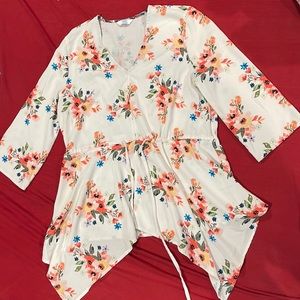 Multi colored flower top. Silky texture.